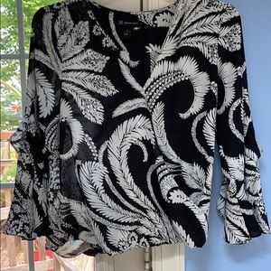 Internat. Concepts PL top overlap front $14